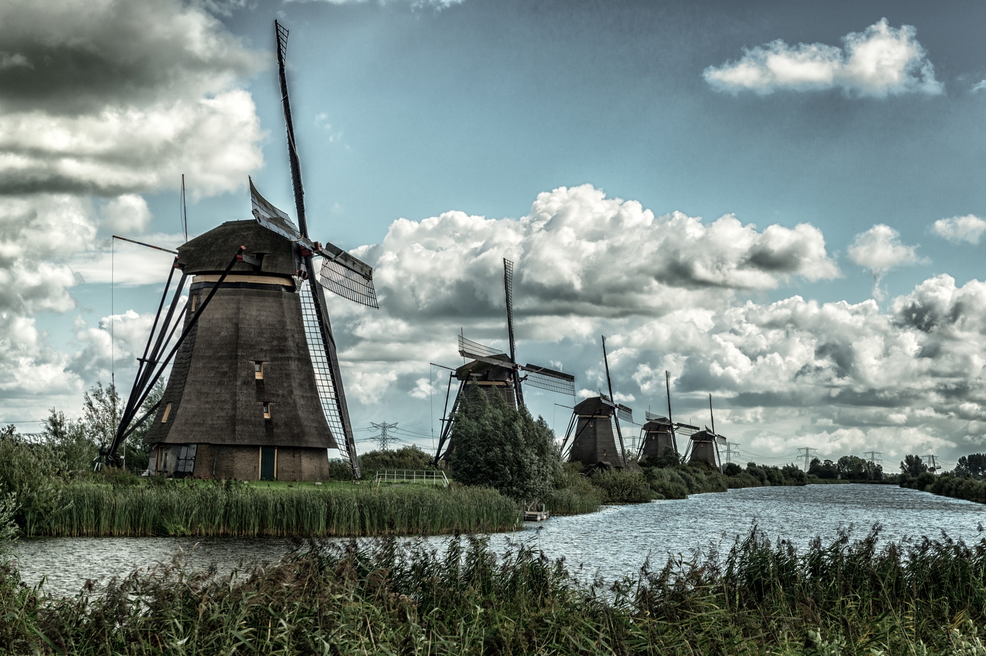 Beautiful Shot Windmills Reflected Lake Breathtaking Cloudy Sky